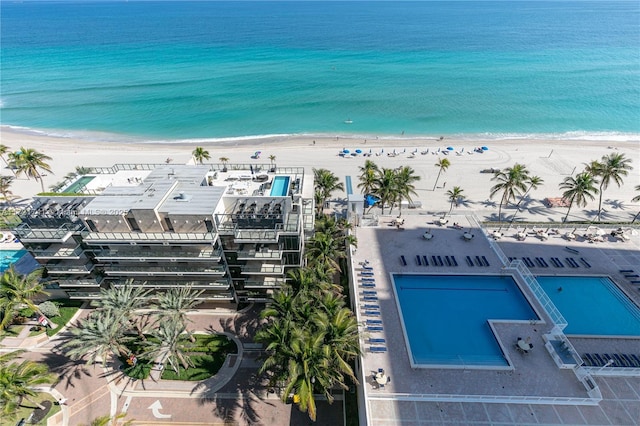 aerial view featuring a water view and a view of the beach