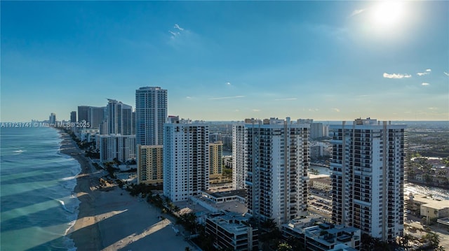 property's view of city with a beach view and a water view