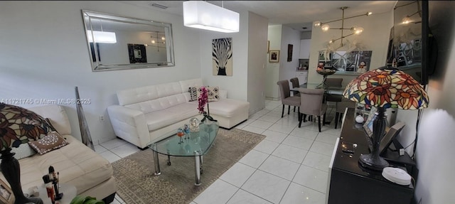 living room with light tile patterned floors