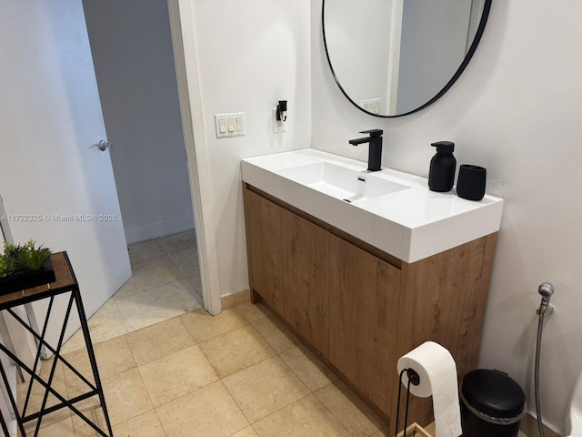 bathroom with vanity and tile patterned floors