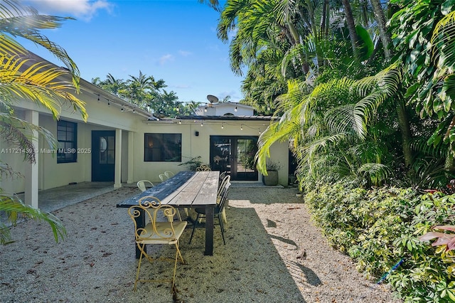 back of house featuring a patio area