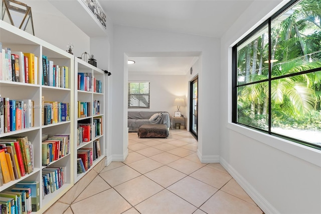 corridor with light tile patterned floors