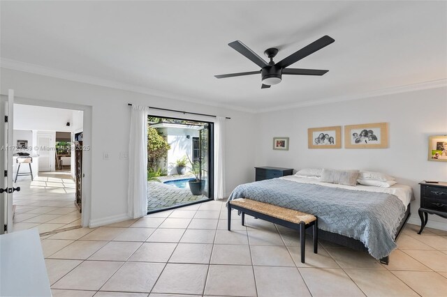 bedroom with light tile patterned flooring, ornamental molding, and access to exterior