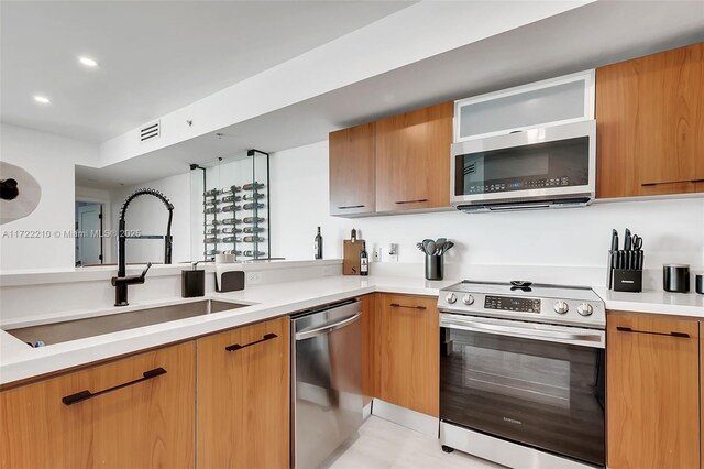 kitchen featuring sink and stainless steel appliances