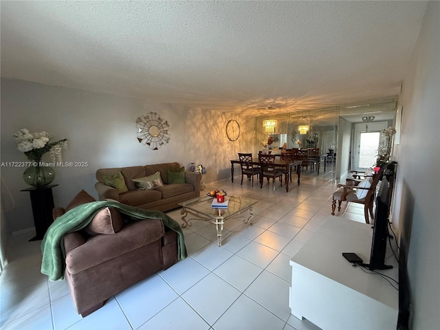 tiled living room featuring a textured ceiling