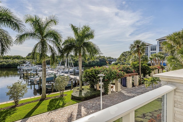 property view of water with a dock