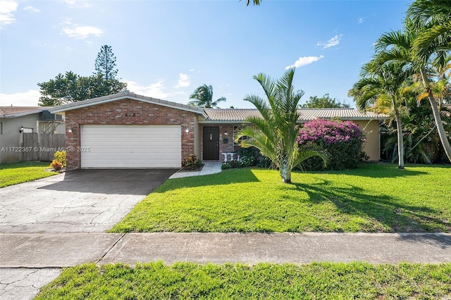 ranch-style home with a front lawn and a garage