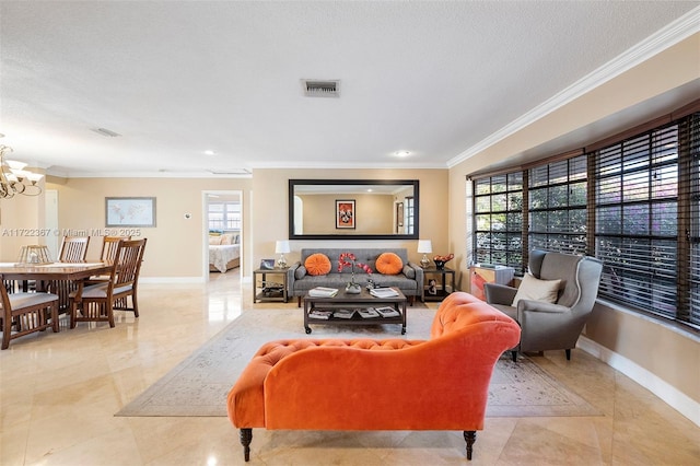 living room with a notable chandelier, plenty of natural light, and ornamental molding