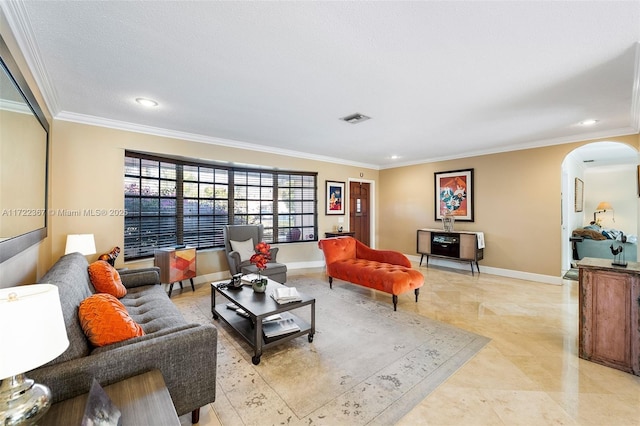 living room featuring crown molding