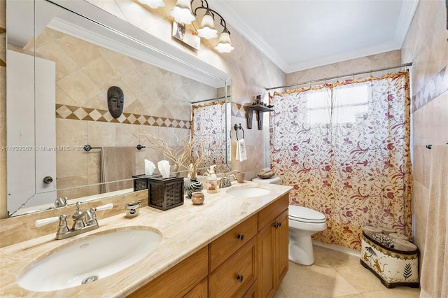 bathroom featuring tile patterned floors, toilet, vanity, and ornamental molding