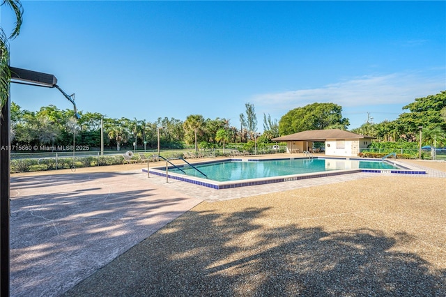 view of pool featuring a patio