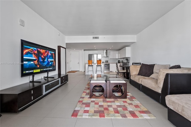 living room featuring light tile patterned flooring