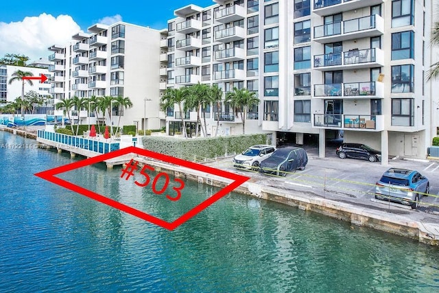 view of pool with a water view