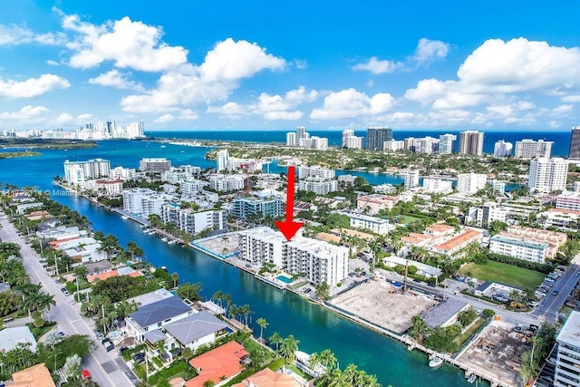 birds eye view of property featuring a water view