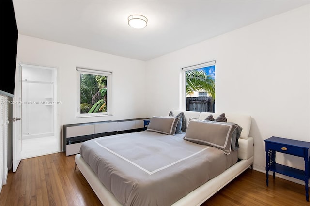 bedroom featuring hardwood / wood-style flooring