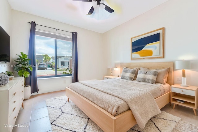 bedroom featuring ceiling fan