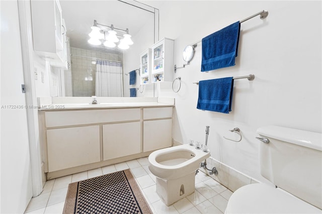 bathroom featuring walk in shower, vanity, a bidet, tile patterned flooring, and toilet