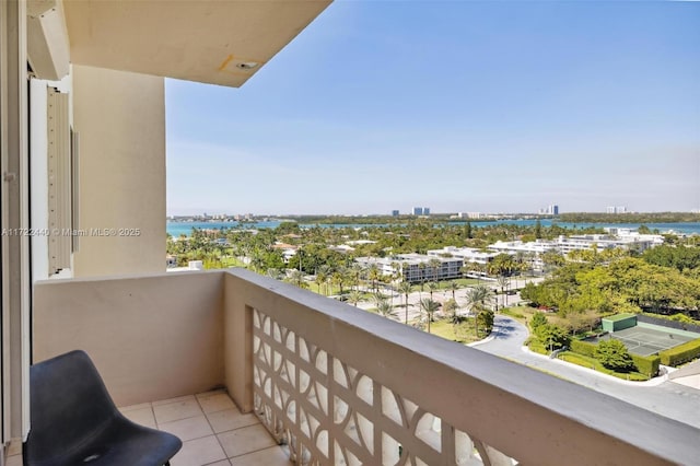 balcony featuring a water view