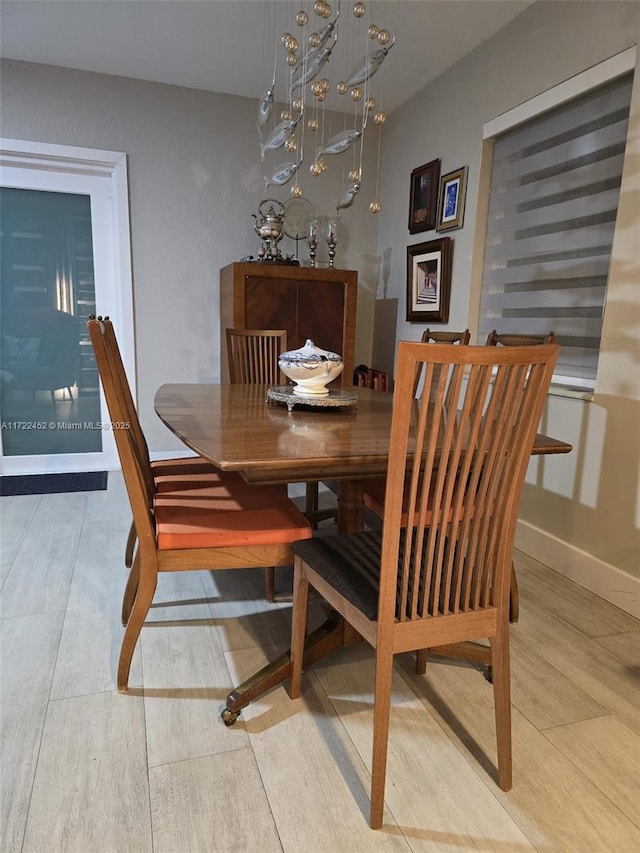 dining area featuring hardwood / wood-style floors