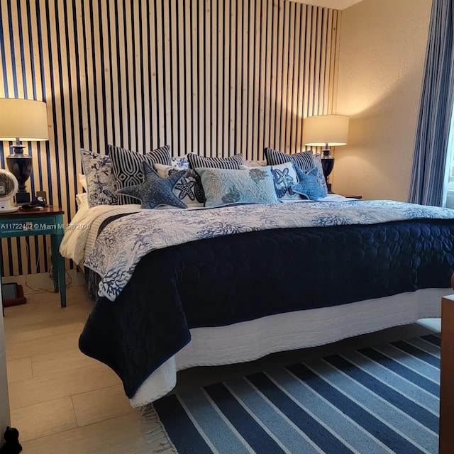 bedroom featuring hardwood / wood-style flooring