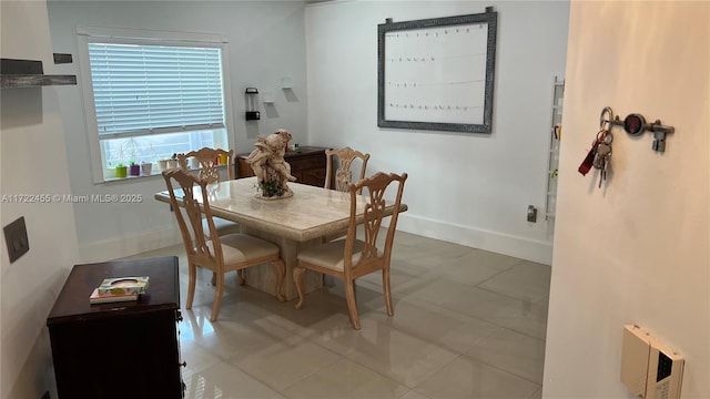 view of tiled dining space