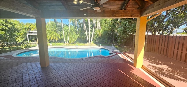 view of pool with ceiling fan