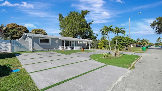 ranch-style house with a front yard