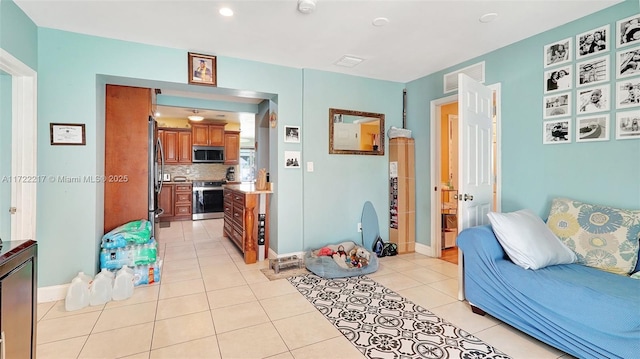 living room with light tile patterned floors