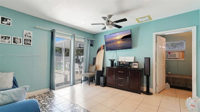 tiled living room with ceiling fan and cooling unit