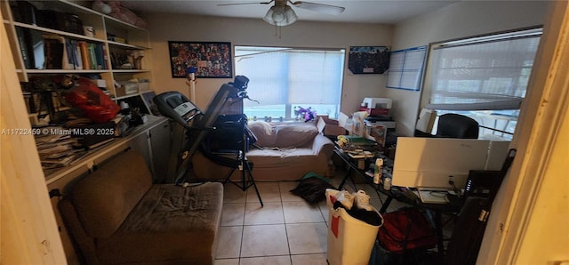 bedroom featuring ceiling fan and light tile patterned floors