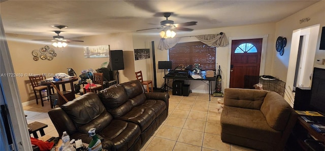 living room featuring ceiling fan and light tile patterned flooring