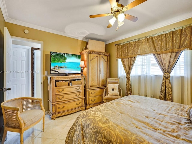 bedroom with ceiling fan, light tile patterned floors, and ornamental molding