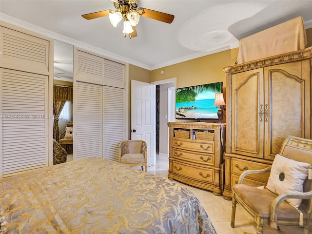 tiled bedroom featuring a closet, ceiling fan, and crown molding