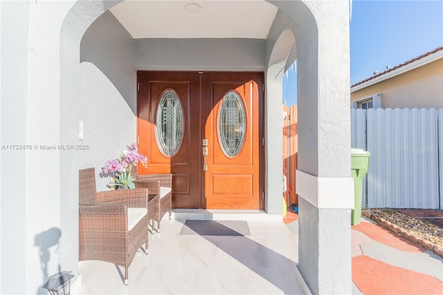 doorway to property featuring a porch