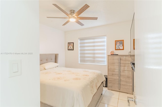 bedroom featuring ceiling fan and light tile patterned flooring