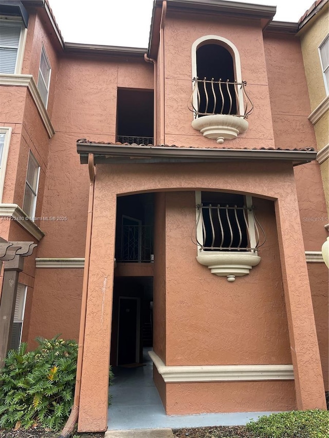 doorway to property with a balcony