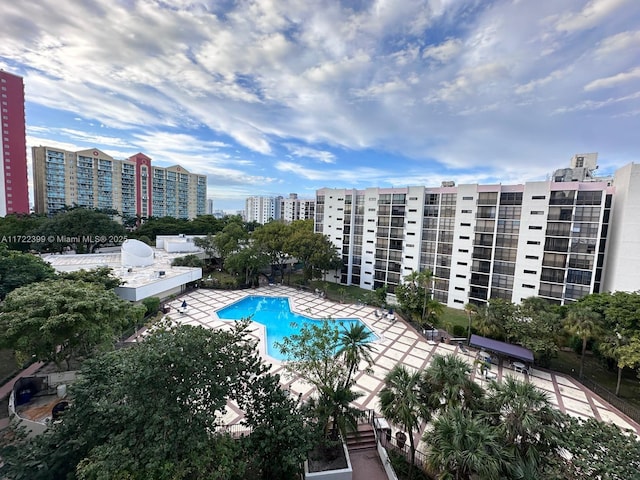 view of swimming pool featuring a patio area