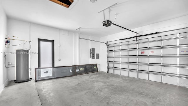 garage with electric panel, a garage door opener, and water heater