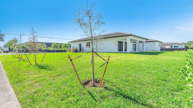 exterior space featuring a lawn