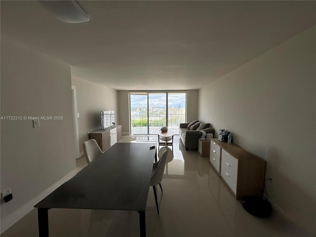 dining area featuring expansive windows