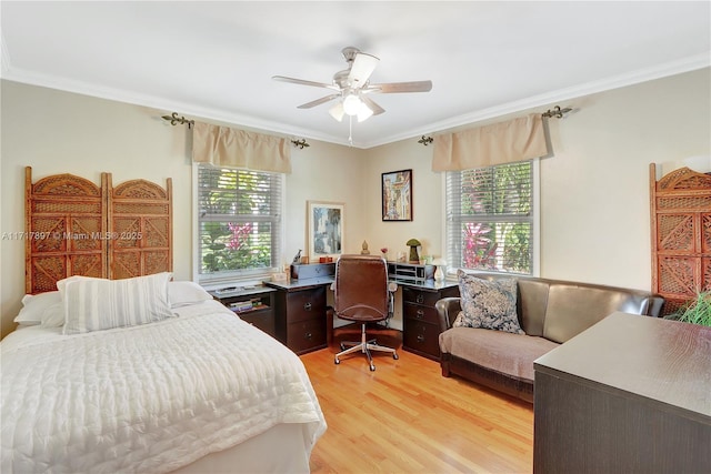 bedroom with ceiling fan, ornamental molding, and light hardwood / wood-style flooring