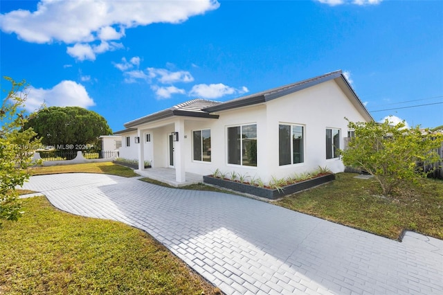 view of front of home with a front yard