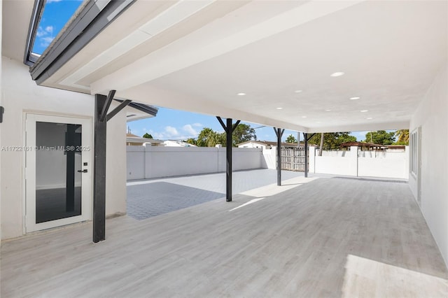 view of patio with a wooden deck