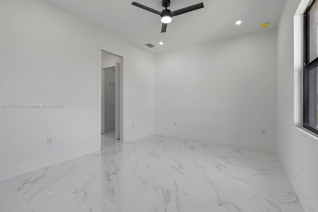 1608 Flora Ave S, Lehigh Acres, FL 33976 - empty room featuring ceiling fan, marble finish floor, visible vents, and recessed lighting