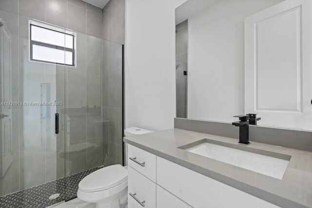 1608 Flora Ave S, Lehigh Acres, FL 33976 - full bath featuring vanity, a shower stall, and toilet