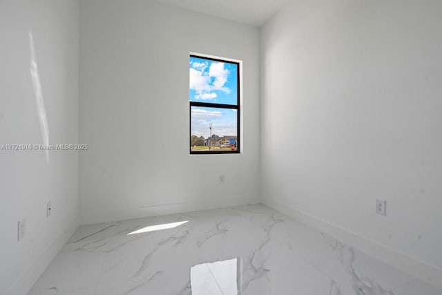 1608 Flora Ave S, Lehigh Acres, FL 33976 - empty room with marble finish floor
