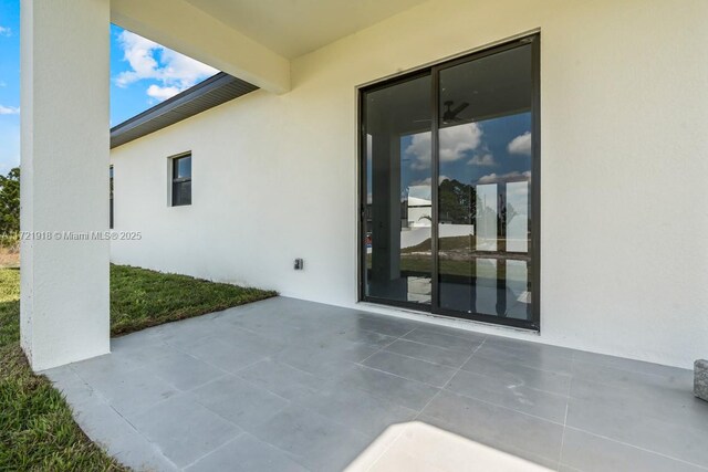 1608 Flora Ave S, Lehigh Acres, FL 33976 - view of patio / terrace