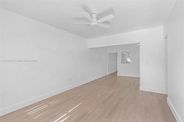 unfurnished room with light hardwood / wood-style flooring and ceiling fan