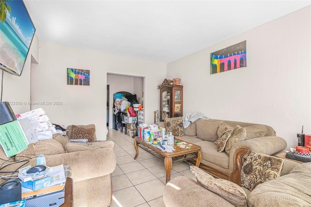 living room featuring light tile patterned flooring