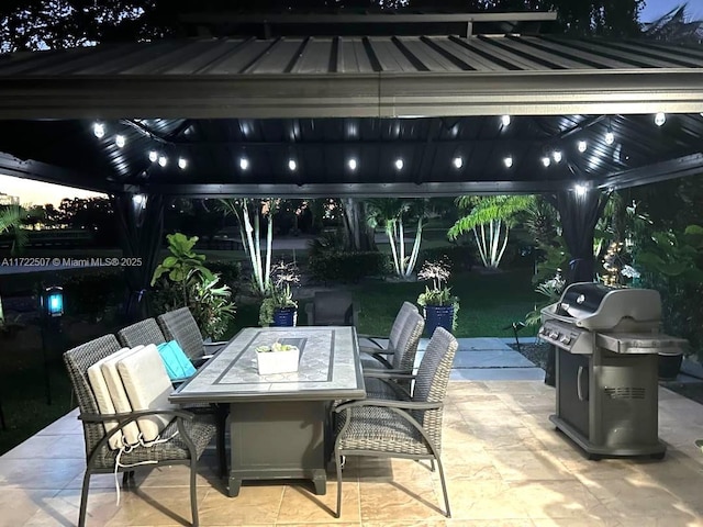 20246 NE 34th Ct Unit 46, Aventura, FL 33180 - view of patio / terrace with a gazebo, outdoor dining area, and a grill